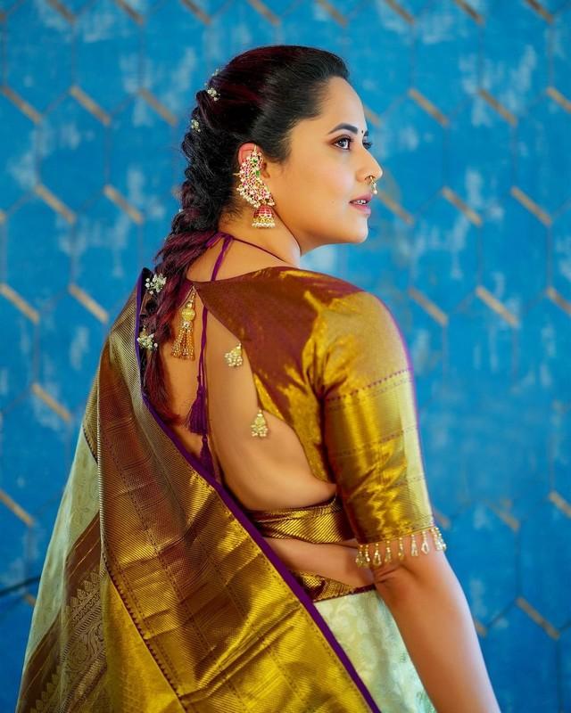 Anasuya Joyful Clicks in Shiny Green Silk Saree | Telugu Rajyam Photos