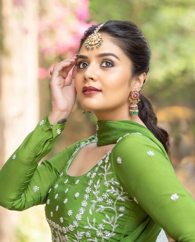 Sreemukhi Glamourous Looks in Green Dress