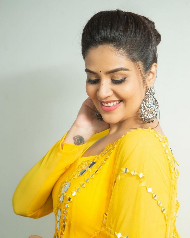 Sreemukhi Looking Awesome in Yellow Dress