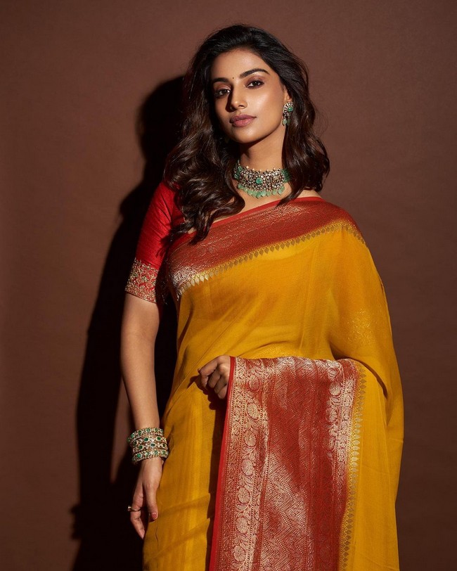 Meenakshii Chaudhary Looks Pretty in Yellow Saree
