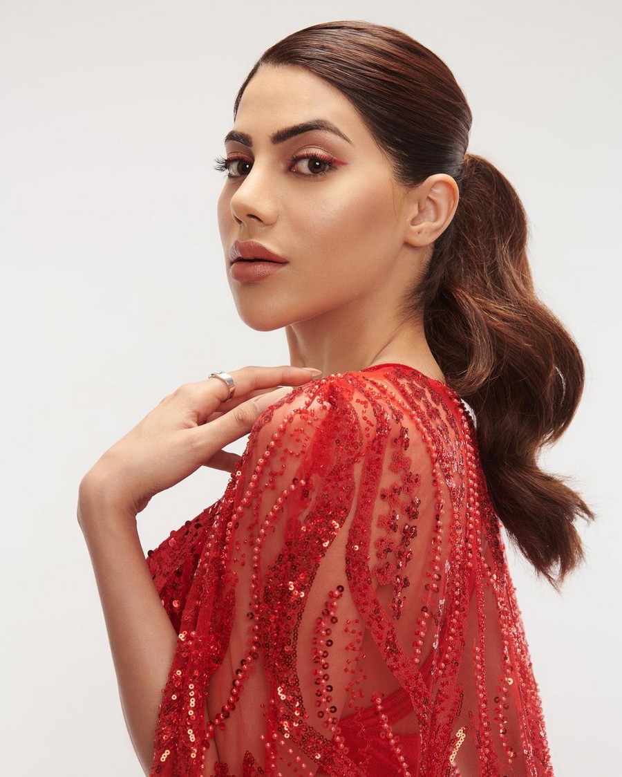 Nikki Tamboli Glamorous Cliks in Red Dress