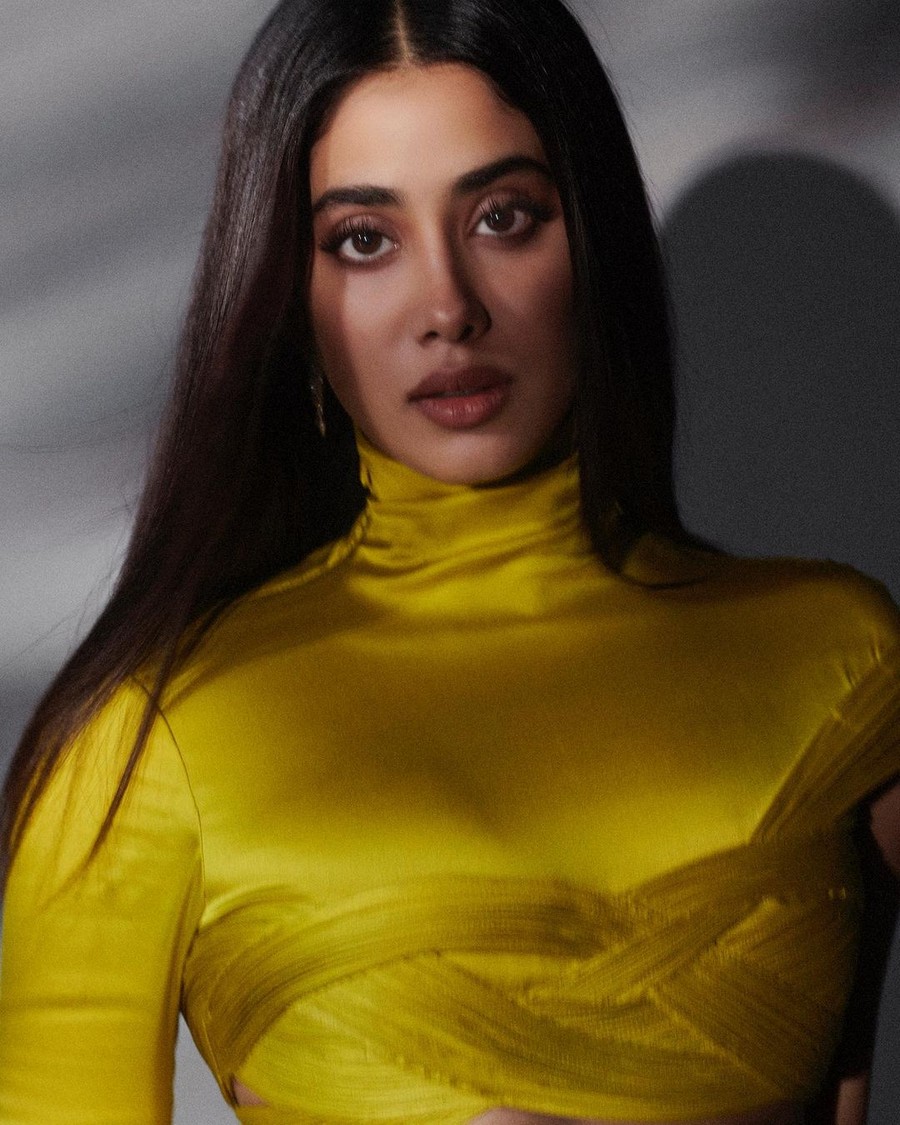 Janhvi Kapoor Memersing Cliks in Shiny Yellow Outfit