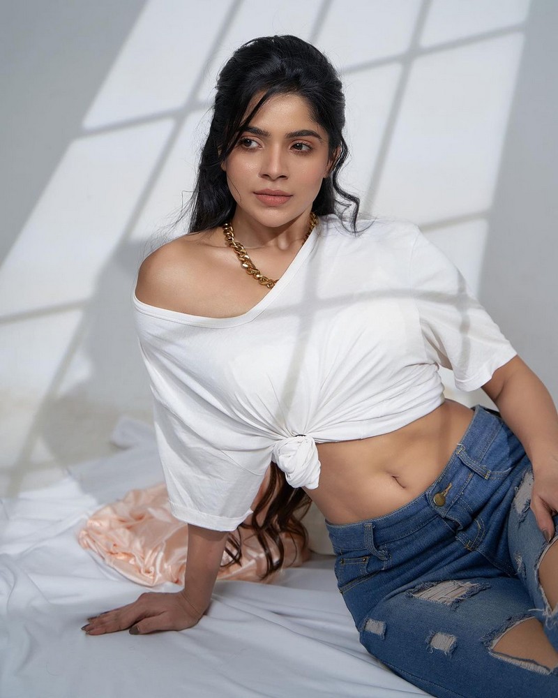 Divya Bharathi Looking Mesmerizing in White Top & Jean