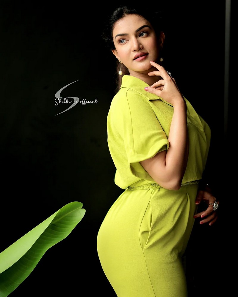 Honey Rose Alluring Poses in Green Outfit