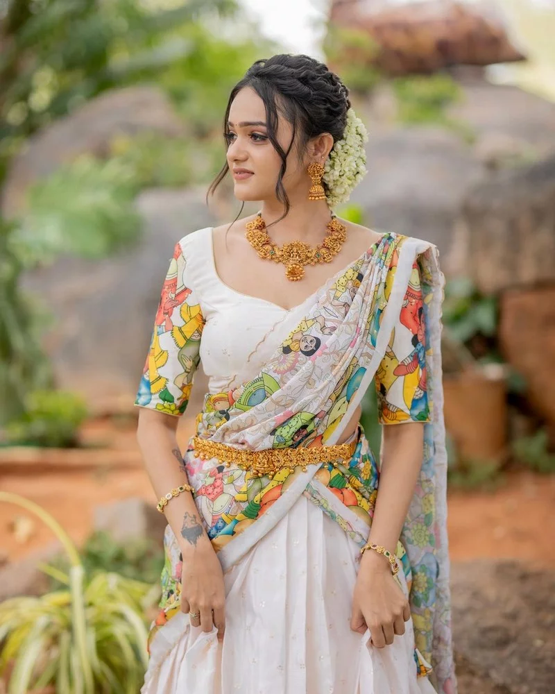 Sri Satya Looking Beautiful in Floral White Half Saree