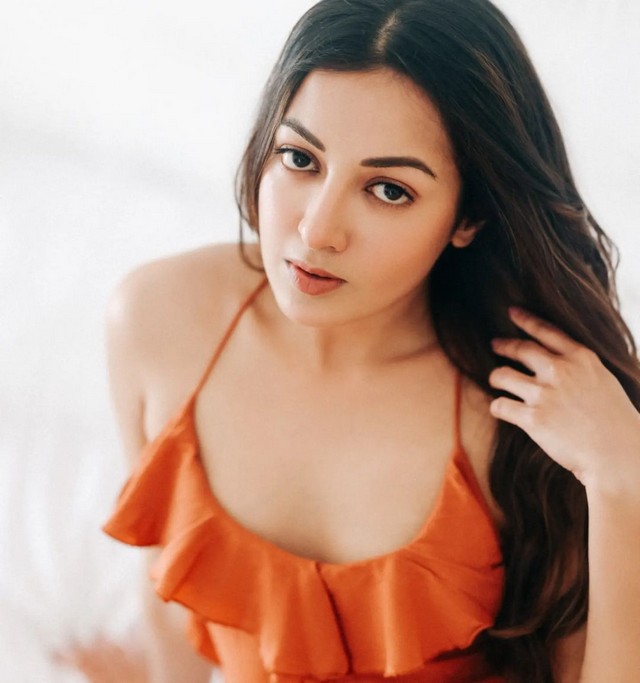 Catherine Tresa Looks Sexy in Orange Outfit