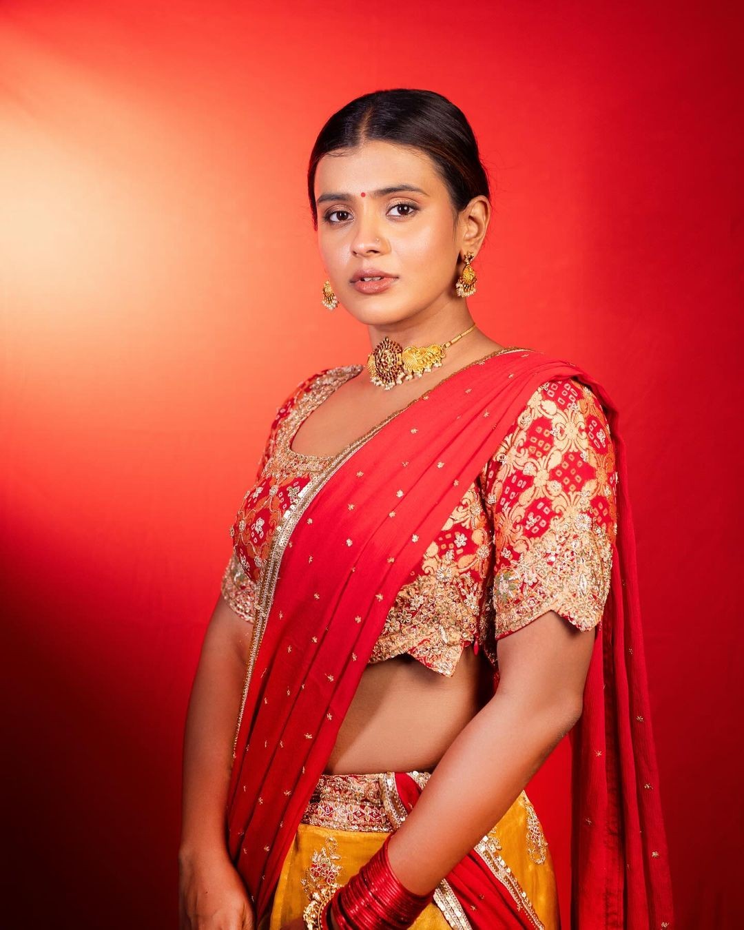 Actress Hebah Patel Looks Beautiful in Red Half Saree